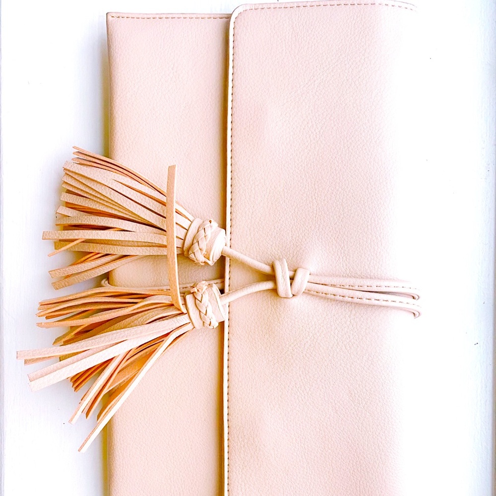 Lulu’s Tassel Clutch in beige. Worn once.
